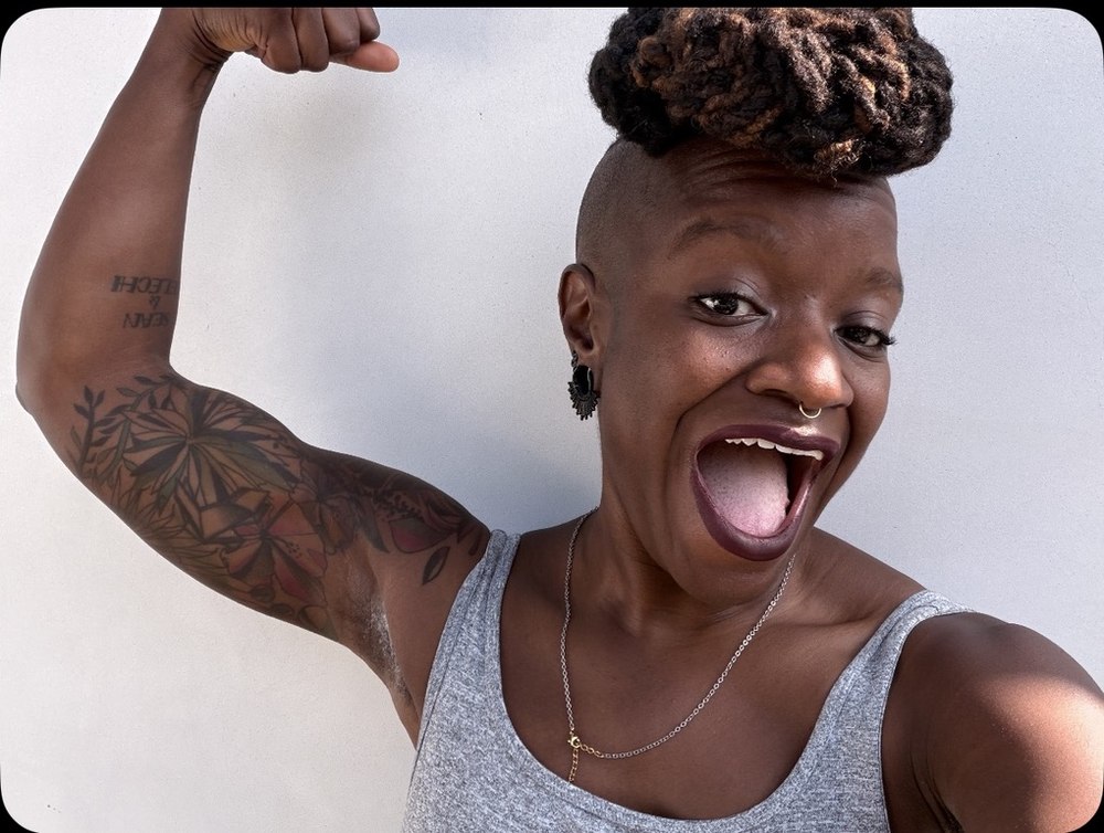 Chinyere Ezie flexing, laughing